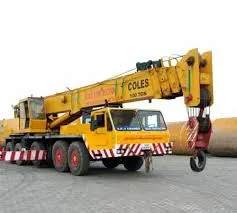 100 ton mobile crane lifting a heavy structural load
