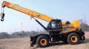 Mobile crane boom extended on site